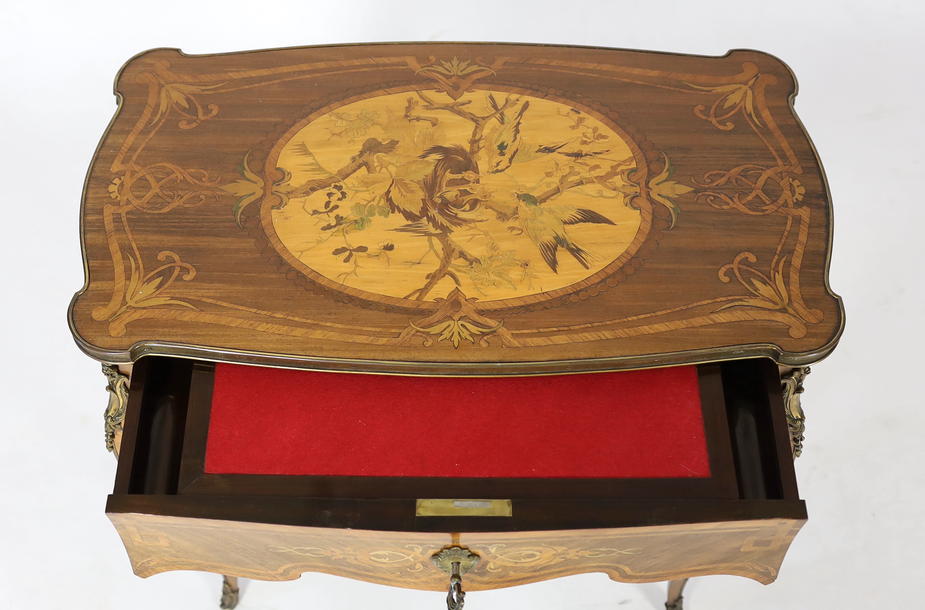 A Louis XV style marquetry side table, 66cm wide, 37cm deep, 68cm high, Please note this lot attracts an additional import tax of 5% on the hammer price
